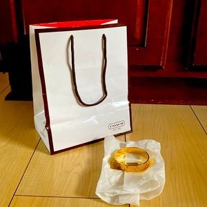 Womens Coach gold bangle very nice